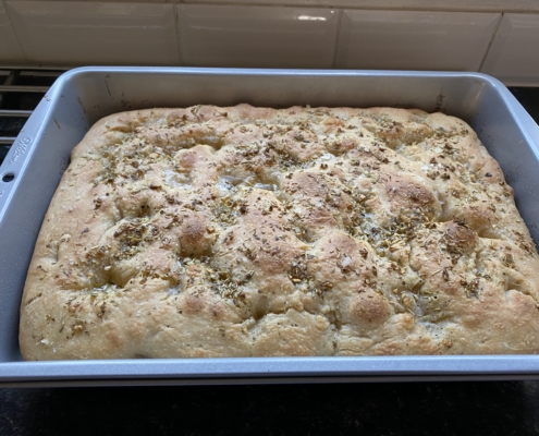 Sourdough focaccia in baking tray